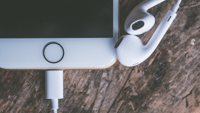 Apple EarPods plugged into Lightning port on iPhone