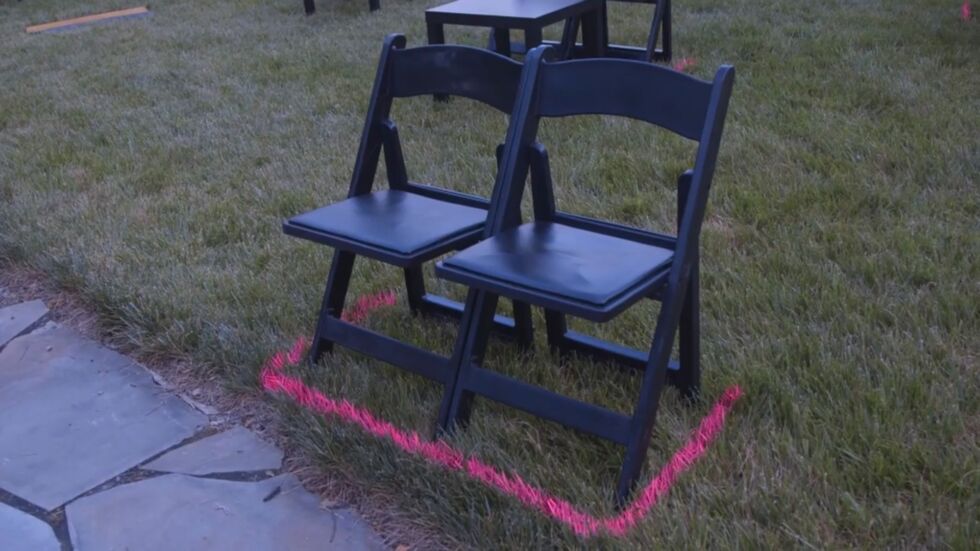 Seats marked off at the proper social distance.